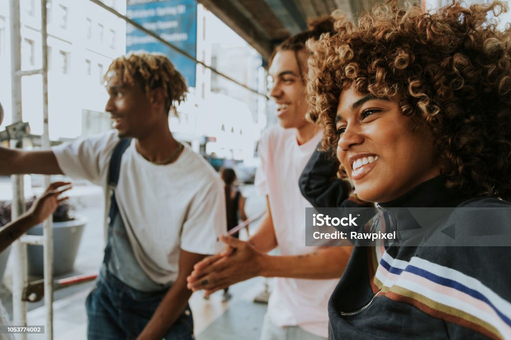 Friends hanging out in the city Teenager Stock Photo