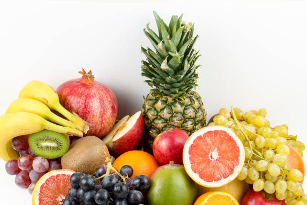 istock Assortment of exotic fruits isolated on white 1053774328