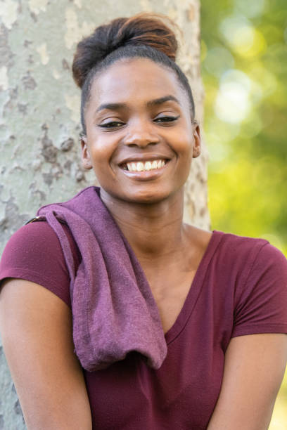 istock Smiling beautiful young black woman 1053774352