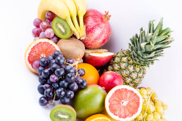 istock Assortment of exotic fruits isolated on white 1053776794