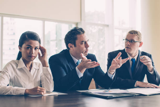istock Three Business Colleagues at Meeting Room 1053783098