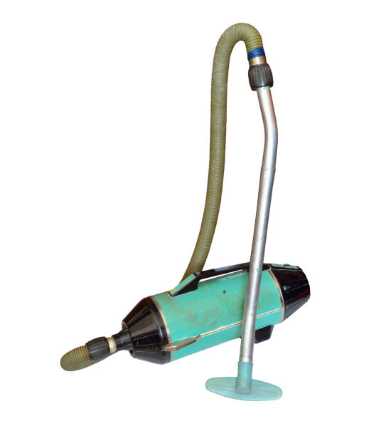 Vintage vacuum cleaner,  sweeper or hoover. Isolated on white background.