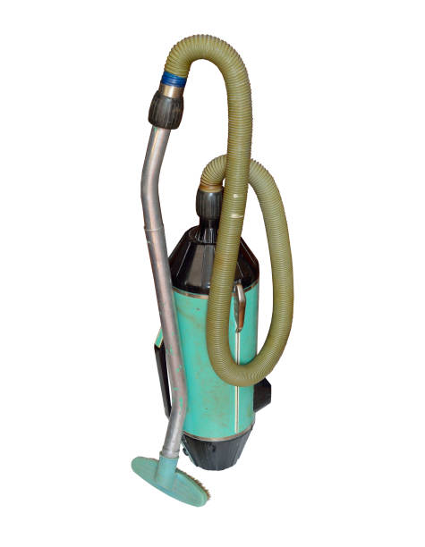 Vintage vacuum cleaner,  sweeper or hoover. Isolated on white background.