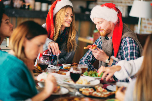 istock Friends having dinner at home at Christmas eve. 1053793266