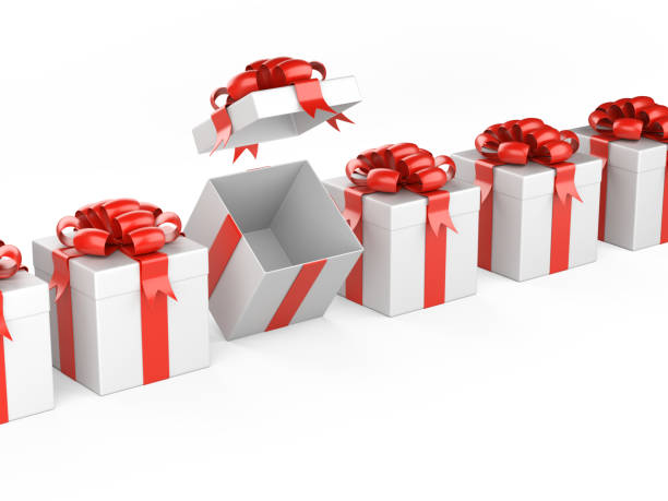 istock Row of gift with bow and ribbon - one box open. 1053796604