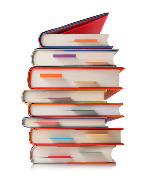 istock Stack of books with bookmark on white background 1053802820