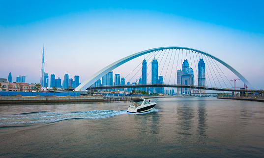 Tolerance bridge and boat in Dubai city, UAE