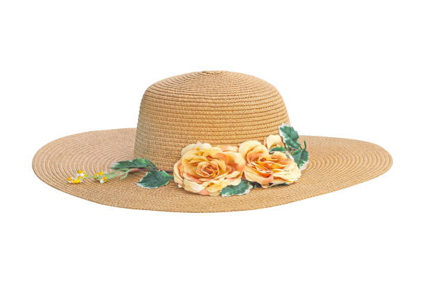 istock Pretty straw hat with flower on white background 1053806474
