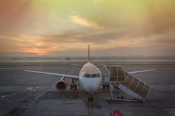istock commercial jet in airport. 1053807336