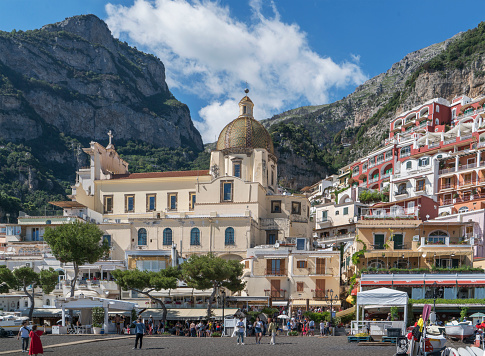 Italy. Amalfi Coast. Positano's colourful houses stacked vertically up the side of the cliff