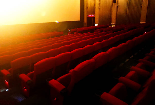 istock Empty Chairs In Movie Theatre 1053809806