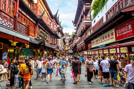 Shanghai, China - July 21st. 2016 - Local and tourists enjoying a hot summer day in downtown Shanghai in China, Asia.