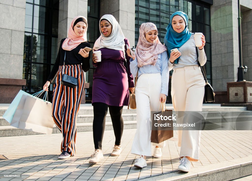 Islamic women friends shopping together on the weekend Shopping Stock Photo