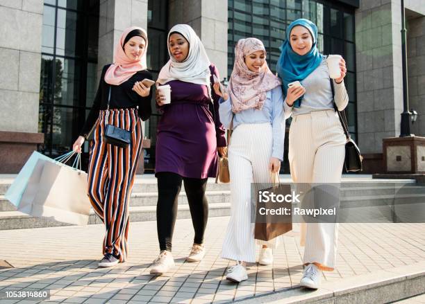 Islamic Women Friends Shopping Together On The Weekend Stock Photo - Download Image Now