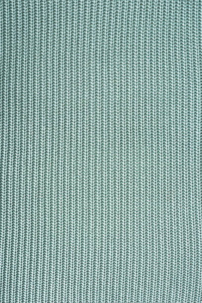 istock close up view of grey woolen fabric as background 1053816944