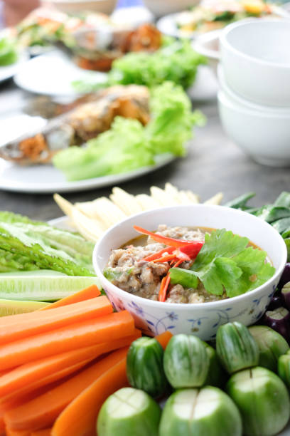 istock Thai food, Fried mackerel with shrimp paste sauce and vegetable. 1053817080