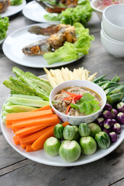 istock Thai food, Fried mackerel with shrimp paste sauce and vegetable. 1053817276