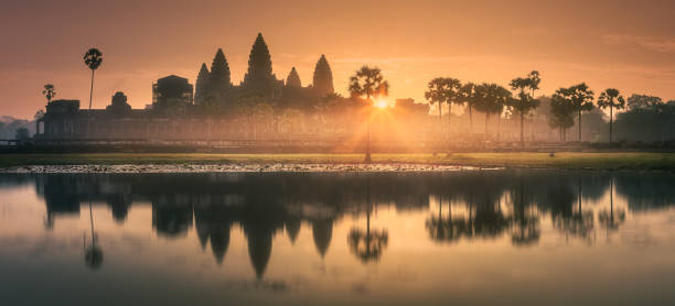 istock Sunrise view of ancient temple complex Angkor Wat Siem Reap, Cambodia 1053825856