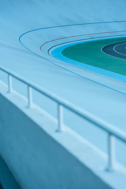 istock close-up view of white railing and empty velodrome, urban background 1053826726