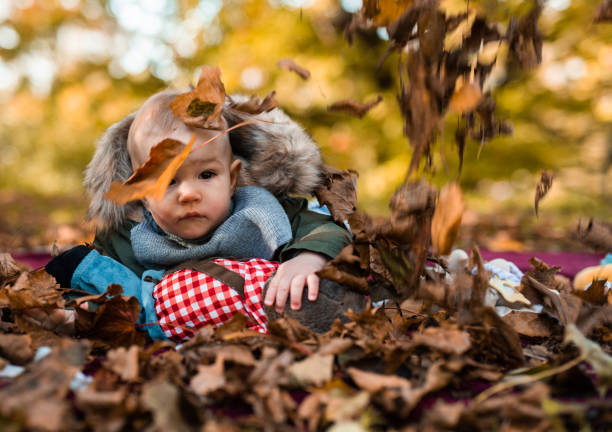 istock Baby boy outdoor. 1053831050