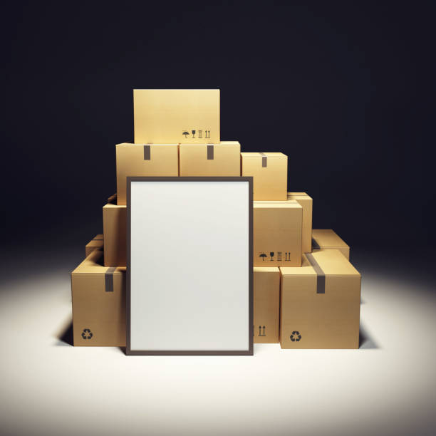 istock pile of cardboard box and empty billboard 1053834160
