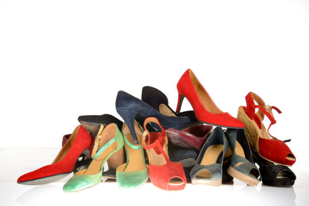 istock Stack of  used woman shoes 1053838528
