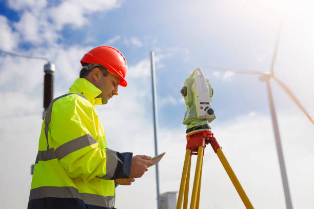 istock Engineer with digital tablet working at wind turbine electricity station 1053838752