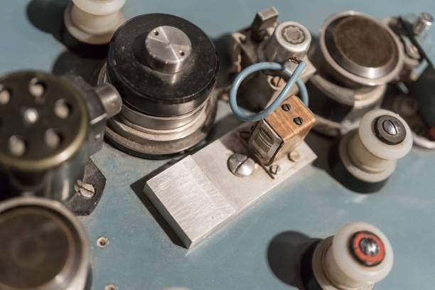 istock Rollers and cogs of a vintage film projector. 1053848936