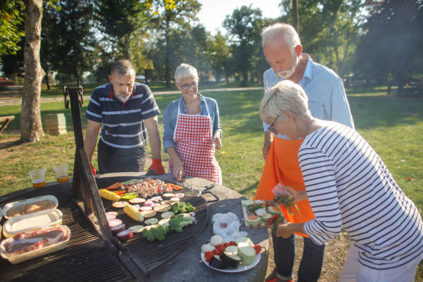 istock Senior people having a picnic 1053862918