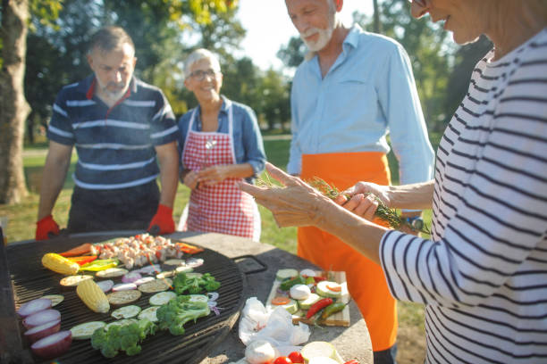 istock Senior people having a picnic 1053862942