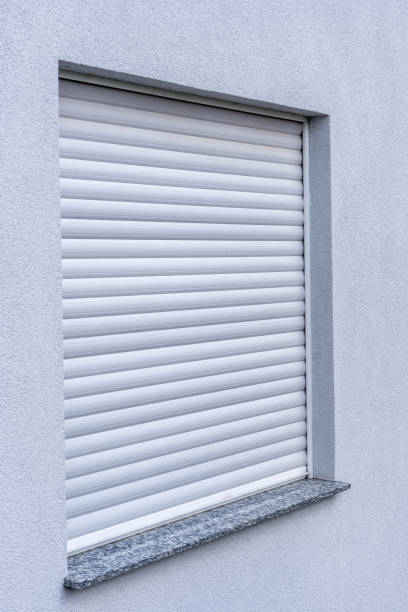 istock Lowered roller shutter as protection against burglary and for a pleasant indoor climate 1053866294