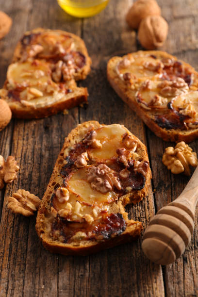 istock bread toast with goat cheese and walnut 1053866348