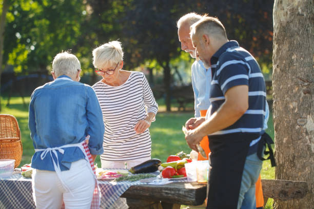 istock Senior people having a picnic 1053866434