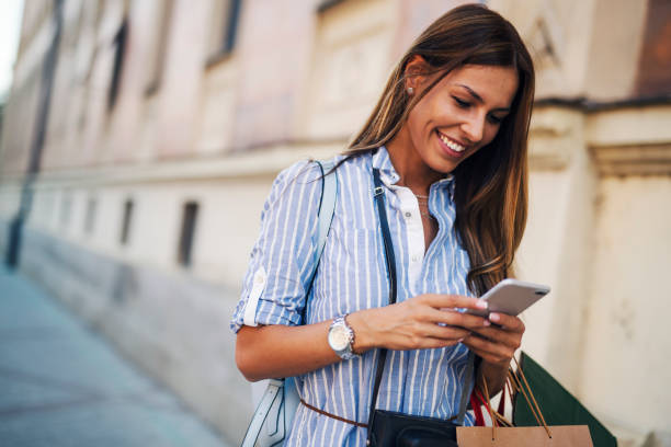 istock Tourist girl using phone 1053873524