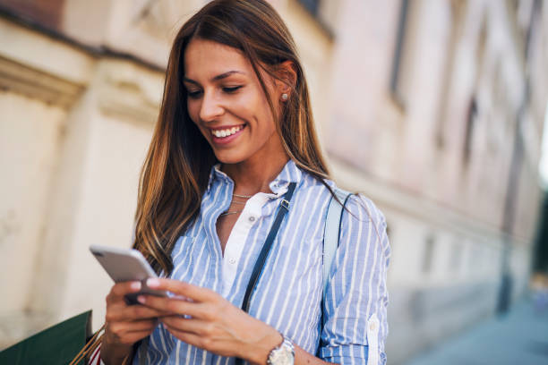 istock Tourist girl using phone 1053873530