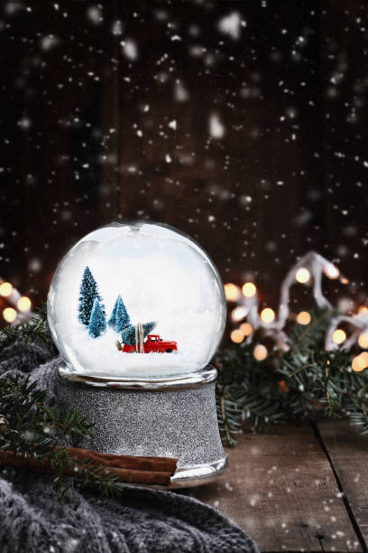 istock Snow Globe with Old Pick Up Truck 1053873706