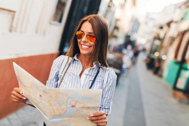 istock Tourist girl exploring the city 1053875304