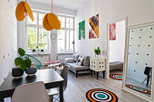 Scandinavian interior, small cosy flat in white with some colors