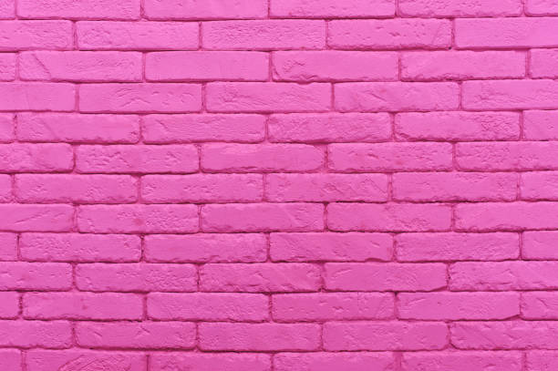 istock pink brick wall painted at pastel tender colour. 1053882444