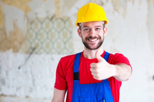 istock Cheering handyman after a job well done 1053882924