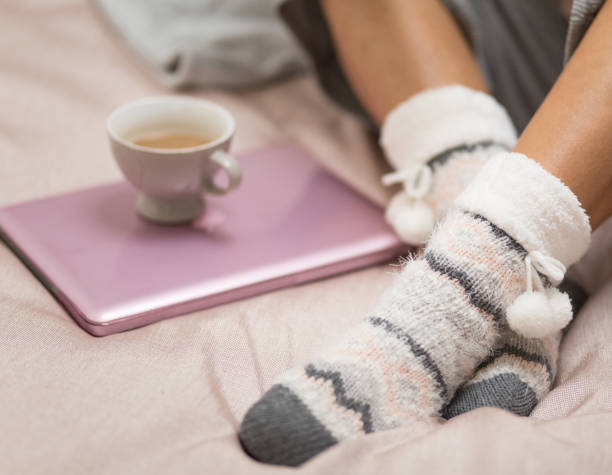 istock Cozy morning in bed - first coffee, then work 1053891834