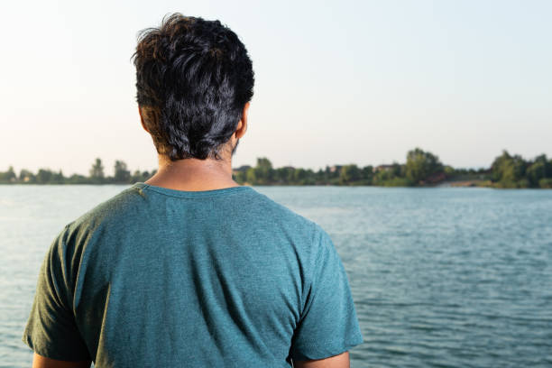istock Man artistic picture with back to camera 1053893230