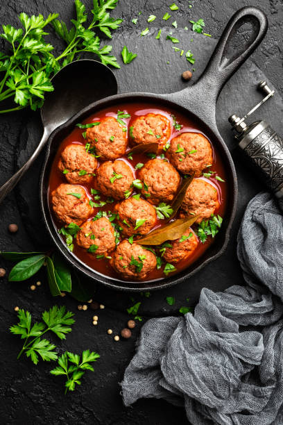 istock Beef meatballs in tomato sauce 1053897406