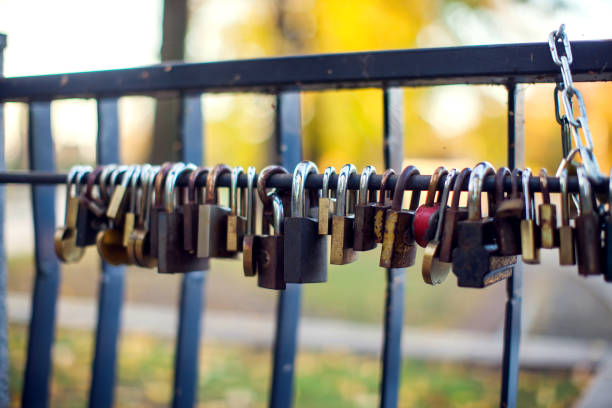 Many different love locks on the bridge Many different love locks on the bridge in the park cologne germany stock pictures, royalty-free photos & images