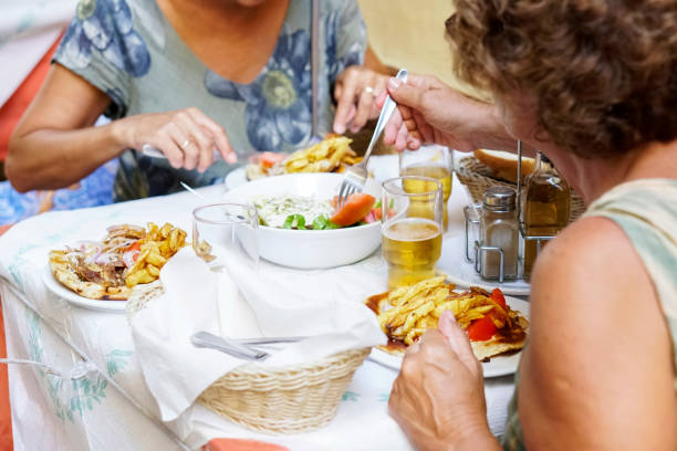 istock Two Senior women exploring the Corfu town 1053901874