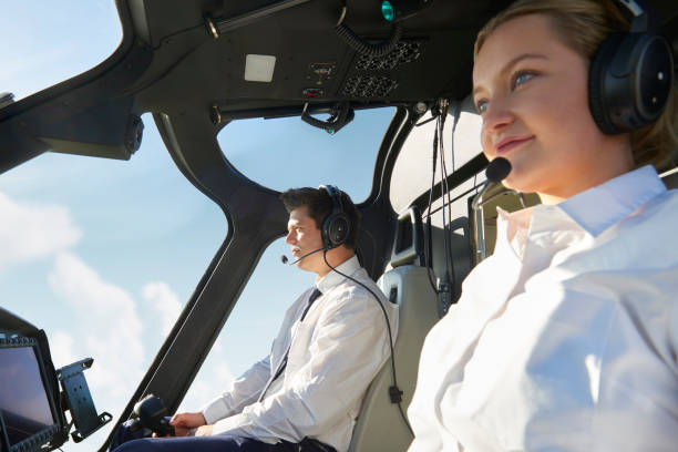 istock Pilot And Co Pilot In Cockpit Of Helicopter 1053905380