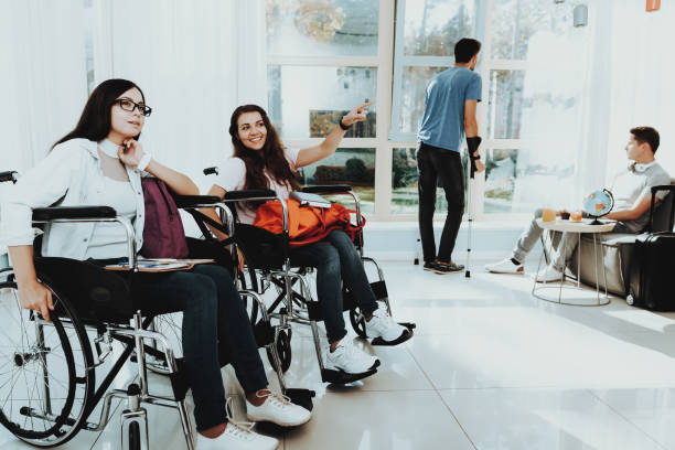 istock Girls Disabled with Handcuff and Guy on Crutches. 1053909226