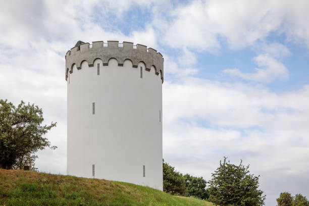 Fredericia is af fortification in Jutland (Denmark)  from 1650 build to prevent the Germans to cross over to the Island of Fuen. In 1909 when the fortification was obsolete, there where build a water tower in a style which fitted the surroundings.