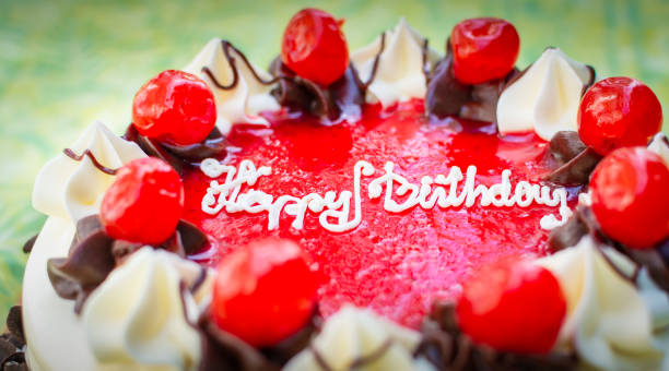 istock Sweet birthday cake with cherry on top. 1053920094