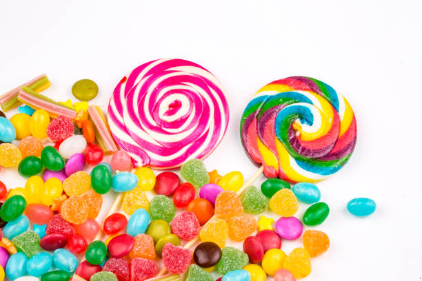 istock Colorful lollipops and different colored round candy. Top view. 1053927320